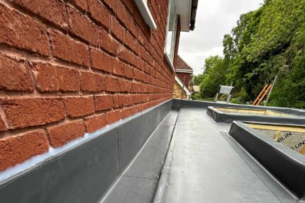 Completed high-quality flat roof extension finishing beautifully ahead of schedule in Surrey.