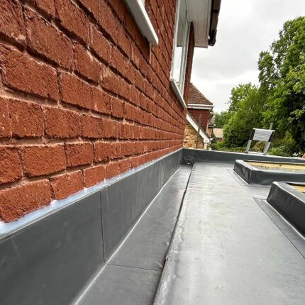 EPDM flat roof membrane with completely watertight skylight integrations installed by our certified contractors for a premium residential property in Kew.