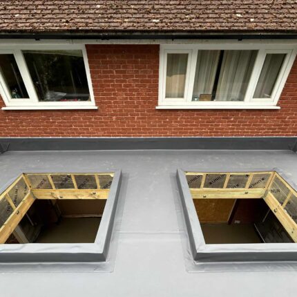 Precision-engineered timber upstands and seamless membrane sealing around a commercial skylight in Kew, showcasing our meticulous london roofing expertise.