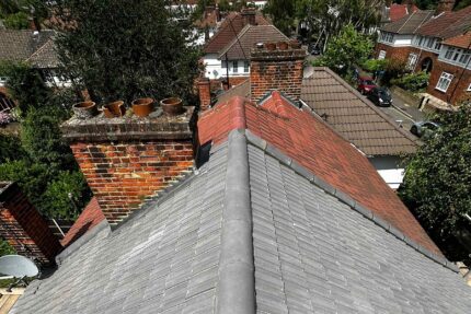 Newly laid Redland 49 concrete tiles providing robust weather resistance on a London roof.