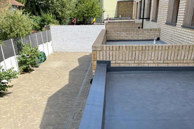 High-performance flat roof upgrade underway on a property in Raynes Park, London.