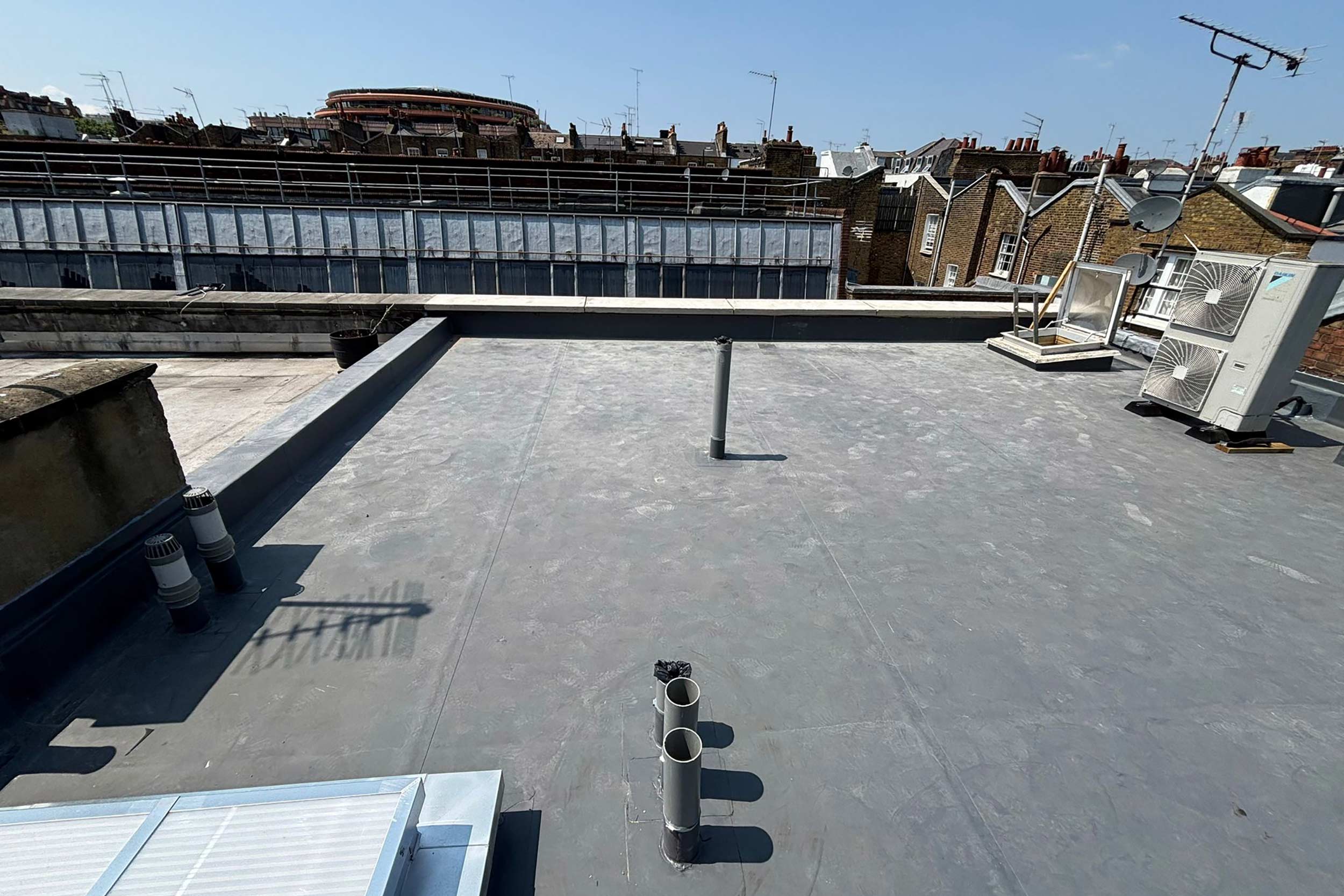 Flat roofer in Chelsea London roof repair specialist contractor, this project involves the installation of a high-performance roofing system.