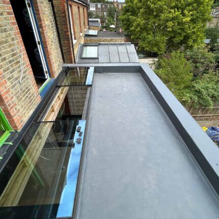 Flat roofer in Barnes London roof specialist roofing company, new build project -installation of a high-performance SikaPro warm roof system.