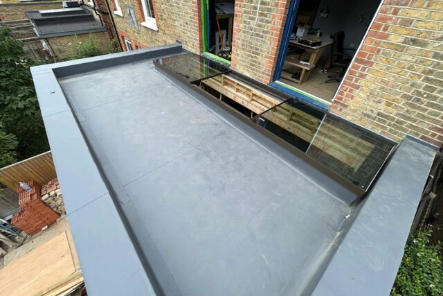 Flat roofer in Barnes London roof specialist roofing company, new build project -installation of a high-performance SikaPro warm roof system.
