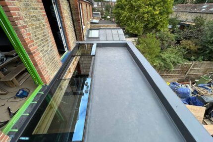 Flat roofer in Barnes London roof specialist roofing company, new build project -installation of a high-performance SikaPro warm roof system.