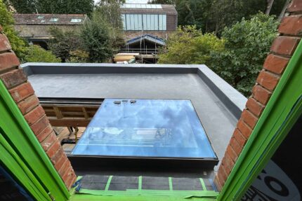 Flat roofer in Barnes London roof specialist roofing company, new build project -installation of a high-performance SikaPro warm roof system.