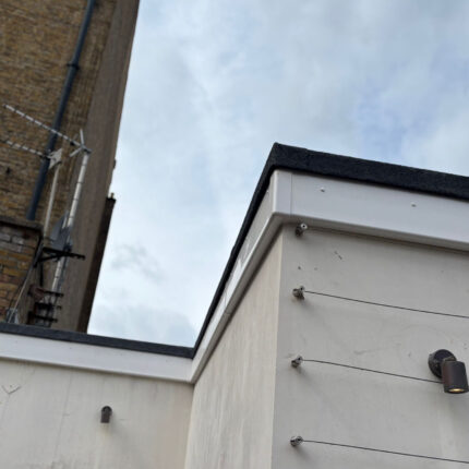 Precision PVC fascia trims and structural membrane edge detailing installed on a Shepherds Bush home by our leading London roofing experts.